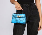 Sac à main en forme de serpent trop chic pour être manipulé